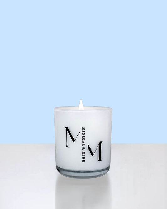 Bahamas Promises Candle Jar in sleek white glass, hand poured with natural coconut soy wax and lit, showcasing vibrant summer vibes.