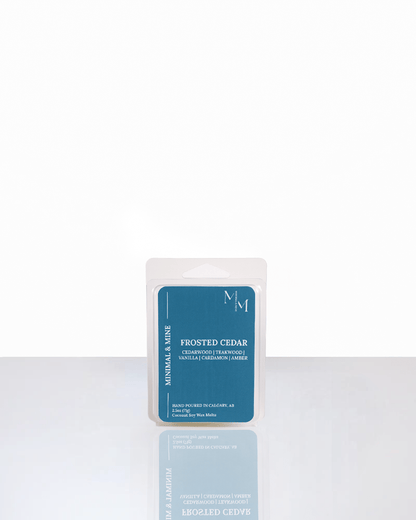 FROSTED CEDAR wax melt package showcasing its fresh and comforting scent profile.