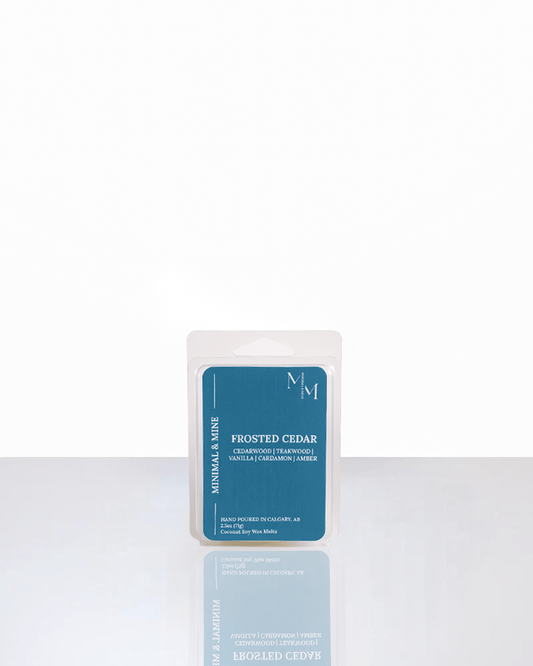 FROSTED CEDAR wax melt package showcasing its fresh and comforting scent profile.
